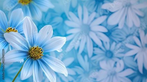 A blue and white flowery background with a blue flower in the foreground with copy space