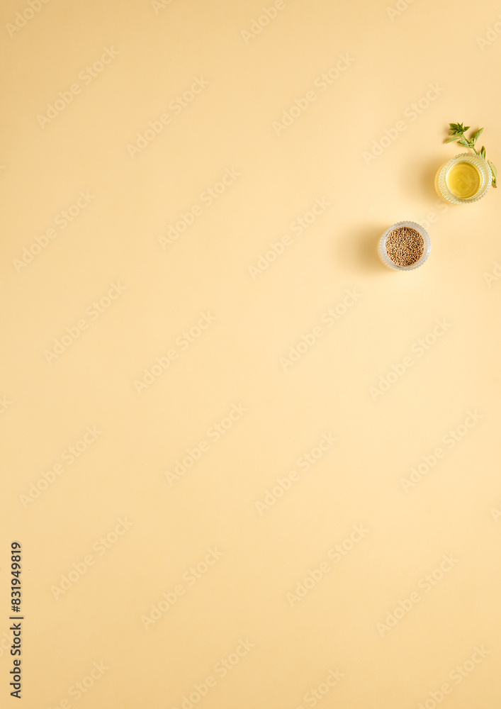 Minimalist food background with mustard seeds and olive oil, copy space. Perfect for recipe layouts and culinary blogs Minimalist food background with mustard seeds and olive oil, copy space. Perfect for recipe layouts and culinary blogs