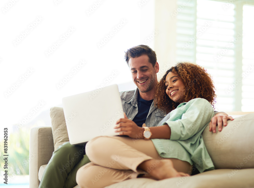 Smile, internet and interracial couple with laptop for watching online video and streaming movie in living room. Happy, black woman and man with computer for social media app and subscription service Smile, internet and interracial couple with laptop for watching online video and streaming movie in living room. Happy, black woman and man with computer for social media app and subscription service