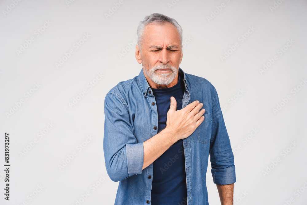 Portrait of sad mature gray haired man suffering from severe heartache, isolated on white Portrait of sad mature gray haired man suffering from severe heartache, isolated on white