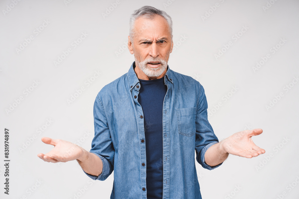 Surprised gray haired bearded senior man holding his hands palms up, isolated on white Surprised gray haired bearded senior man holding his hands palms up, isolated on white