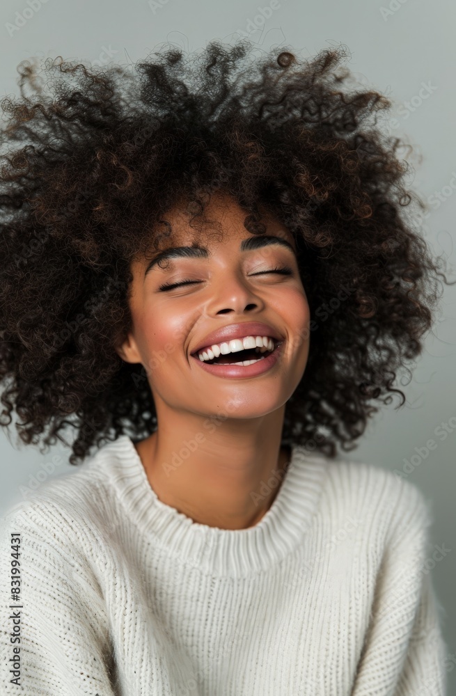 smiling woman with curly hair