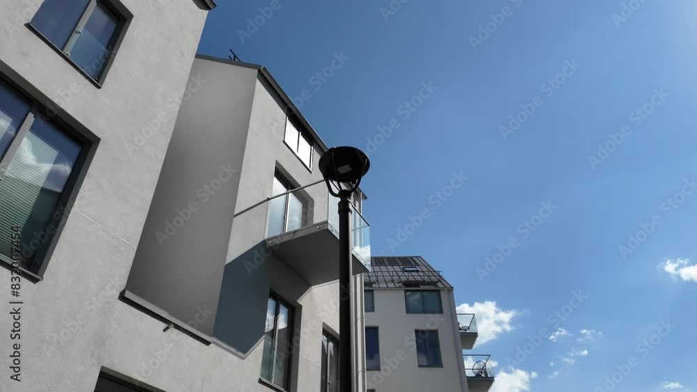 4K Video of Modern Residential Building in Newly Developed Paupys District, Vilnius, Lithuania on a Clear Sunny Day 4K Video of Modern Residential Building in Newly Developed Paupys District, Vilnius, Lithuania on a Clear Sunny Day