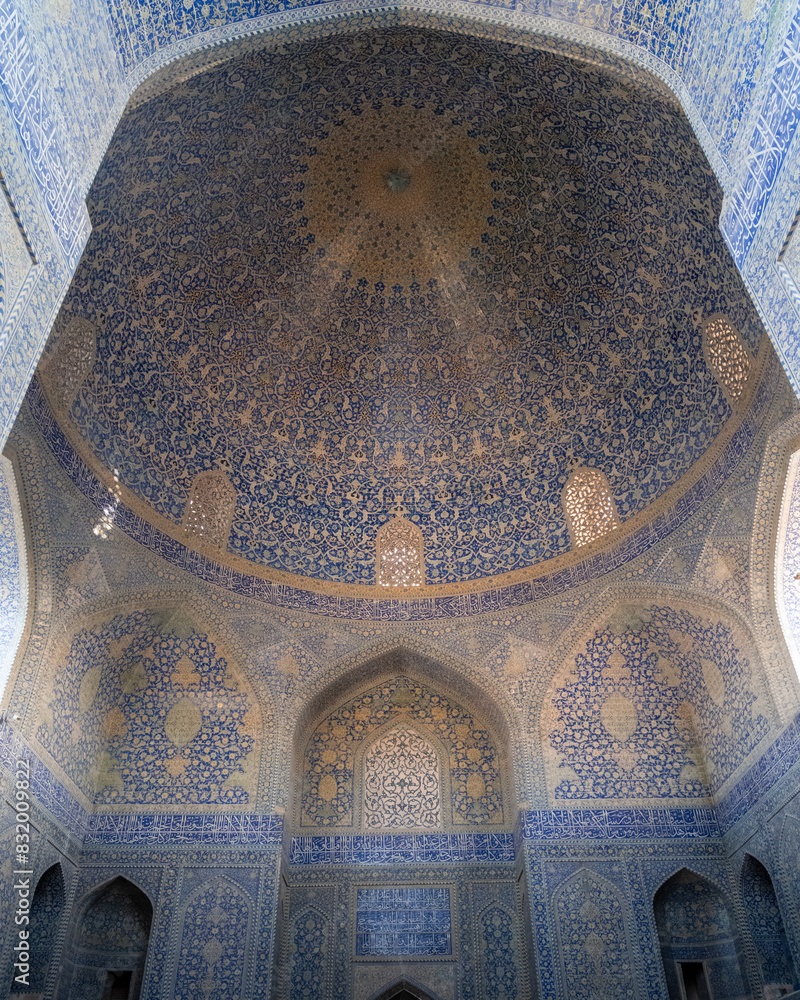 Beautiful Shah Mosque in Isfahan, Iran with blue and gold tile work