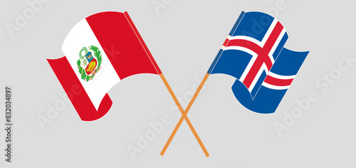 Crossed and waving flags of Peru and Iceland