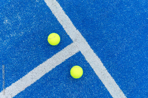 overhead view of two balls on a paddle tennis court © VicVaz