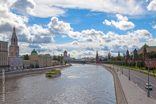 Boat passing by the Moscow Kremlin Wall photo