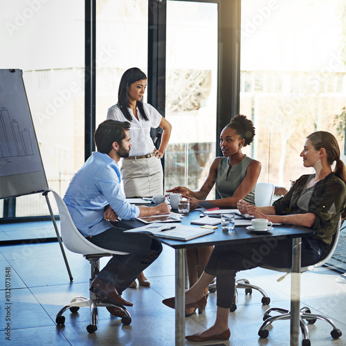 Business, presentation and meeting in office with girl speaker for financial, review and budget, training or plan discussion. Learning, workshop and accounting team in support for whiteboard coaching