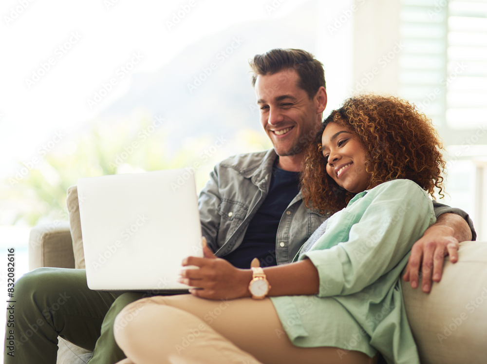 Φωτογραφία Happy, internet and interracial couple with laptop for watching online video and streaming movie in living room