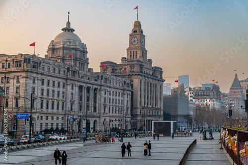 The Bund, waterfront area, Central Shanghai at sunset, Shanghai, China photo