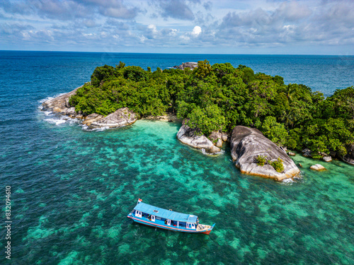 Aerial of little Keciput granite rock island, Belitung island off the coast of Sumatra, Indonesia photo