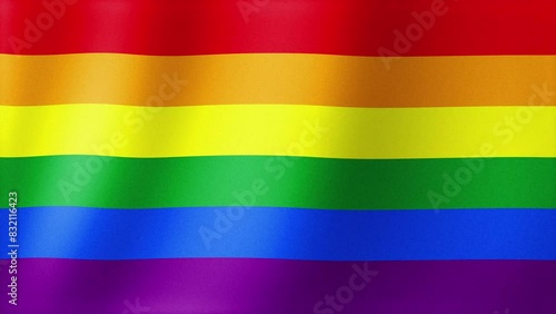 Looped bright flag of the LGBT community. Rainbow wavy silk colored background. Fabric texture. A symbol of gender equality for everyone. 4k, 60 fps, HD photo
