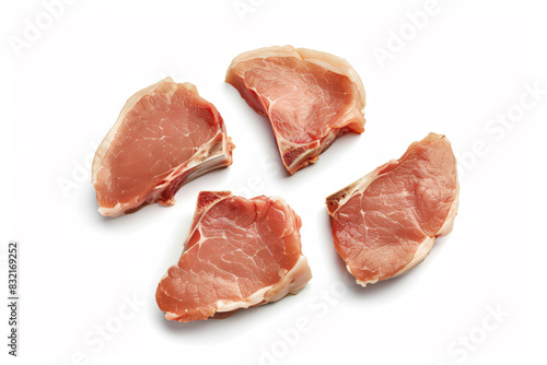a group of pieces of meat on a white surface