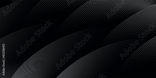 Abstract shining gray curved lines on black background.