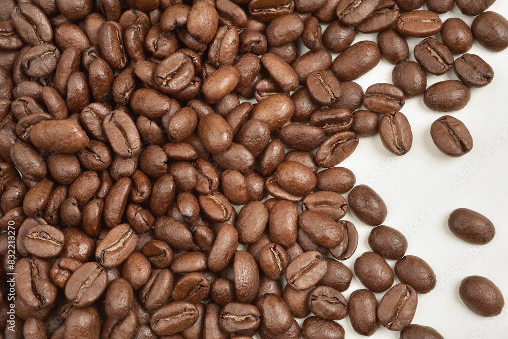 Close up photograph of the coffee beans with details. Coffee is one of the oldest traded commodities in the world. Close up photograph of the coffee beans with details. Coffee is one of the oldest traded commodities in the world.