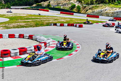 Young racers competing with karts on a Karting circuit in Barcelona. Lifestyle