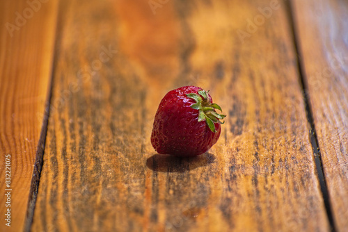 Strawbery on wodden table. 