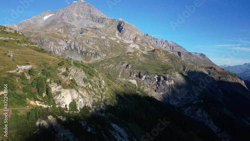 Slow flight across the side of the mountains above Tignes Les Brevieres and Tignes Les Boisses photo