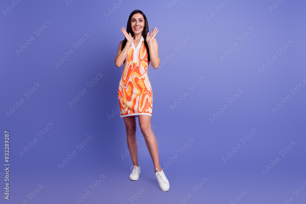 Full length portrait of nice lady empty space ad wear dress isolated on purple color background Full length portrait of nice lady empty space ad wear dress isolated on purple color background