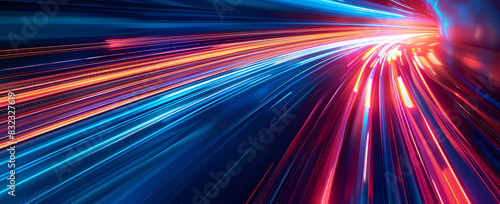 Abstract illustration depicting high-speed light trails in 3D  creating a dynamic and futuristic backdrop. The red and blue light motion trails convey a sense of fast movement and modern technology.