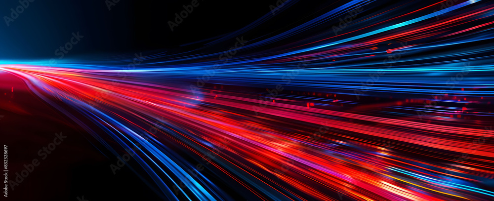 Abstract illustration depicting high-speed light trails in 3D, creating a dynamic and futuristic backdrop. The red and blue light motion trails convey a sense of fast movement and modern technology. Abstract illustration depicting high-speed light trails in 3D, creating a dynamic and futuristic backdrop. The red and blue light motion trails convey a sense of fast movement and modern technology.