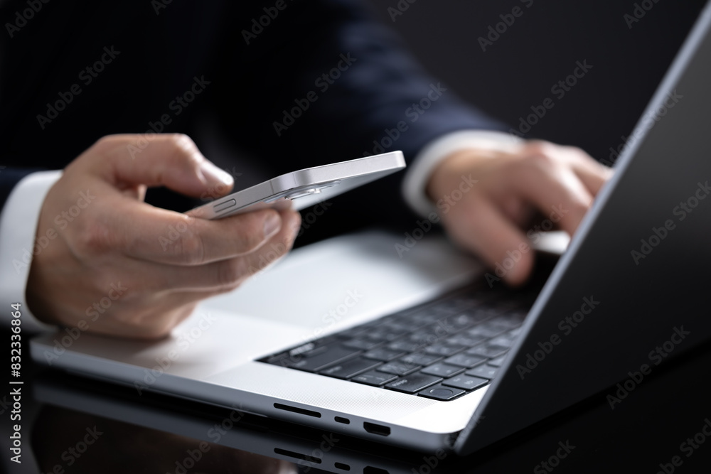 Close-up of a person's hand using a mobile phone for online shopping. Close-up of a person's hand using a mobile phone for online shopping.