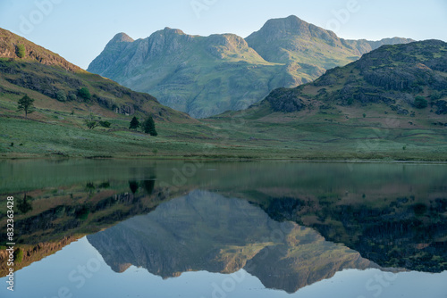 Pike O' Stickle reflection in Blea Tarn at sunrise photo