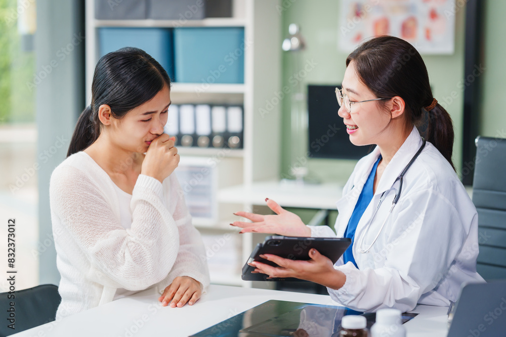Asian female doctor specializing in psychiatry online consultations from desk, psychotherapy, diagnosis, treatment, counseling to psychiatric patients disorders depression, anxiety, schizophrenia. Asian female doctor specializing in psychiatry online consultations from desk, psychotherapy, diagnosis, treatment, counseling to psychiatric patients disorders depression, anxiety, schizophrenia.