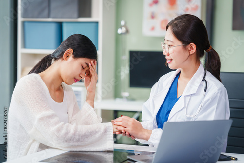 Asian female doctor specializing in psychiatry online consultations from desk, psychotherapy, diagnosis, treatment, counseling to psychiatric patients disorders depression, anxiety, schizophrenia. photo