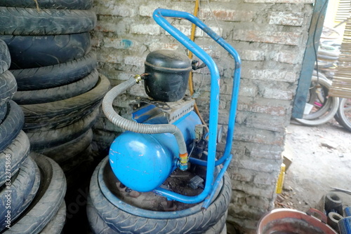 Wallpaper Mural The bicycle tire pump. Torontodigital.ca