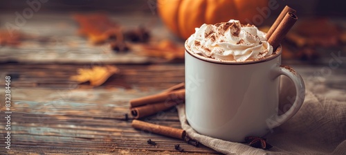 Pumpkin Spice Latte with Cinnamon Sticks and Whipped Cream, Cozy Fall Beverage photo