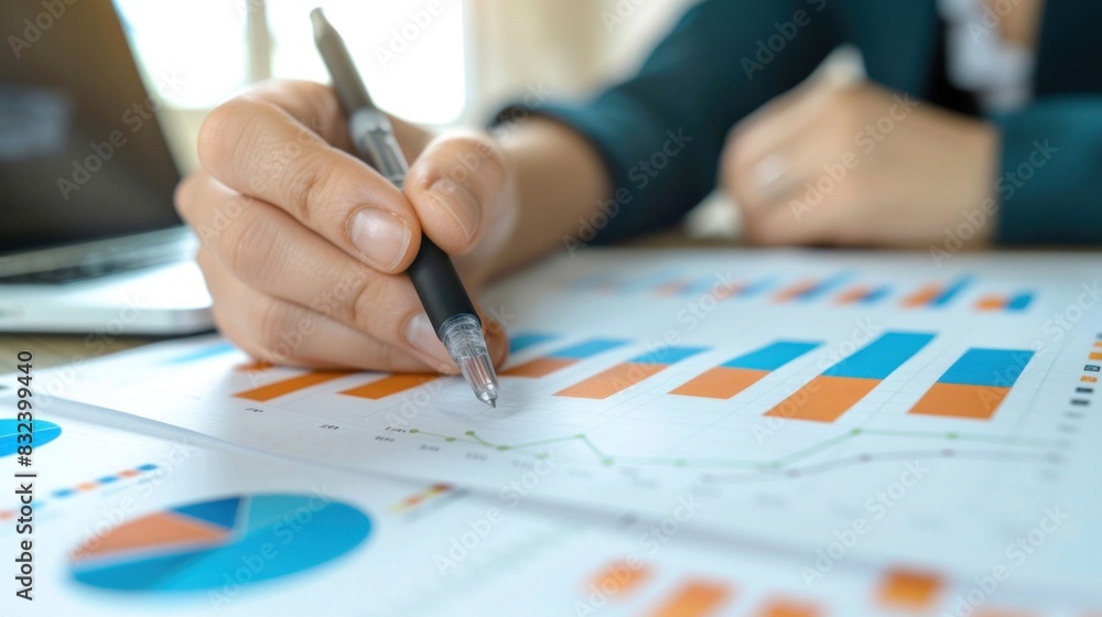 analysis working with the latest financial results. Analysis of sales forecast graphs, financial accounting with hand writing Abstract digital effect for background analysis working with the latest financial results. Analysis of sales forecast graphs, financial accounting with hand writing Abstract digital effect for background