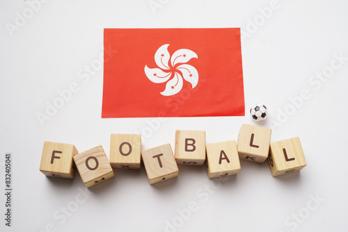 Hong Kong flag with football title and white background. football concept photo