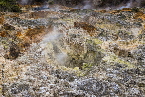 Sulphur and other minerals at an active fumarole field by Lake Linow, a volcanic attraction south of Tomohon city, Lake Linow, Tomohon, North Sulawesi, Indonesia photo