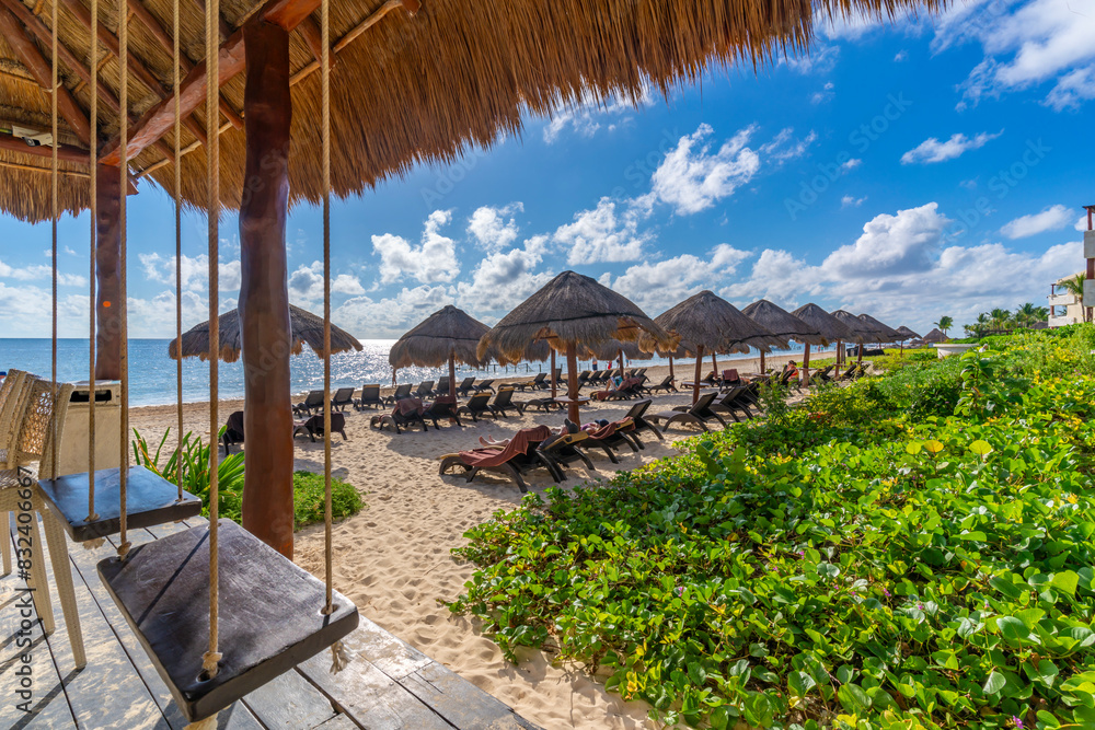 View of beach and sunshades at Puerto Morelos, Caribbean Coast, Yucatan Peninsula, Riviera Maya View of beach and sunshades at Puerto Morelos, Caribbean Coast, Yucatan Peninsula, Riviera Maya