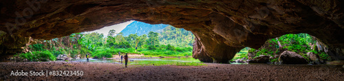 Entrance to Hang En Cave, the first cave and camp site of Son Doong trek in Vietnam. The cave is in Phong Nha - Ke Bang National Park, UNESCO world heritage site. photo