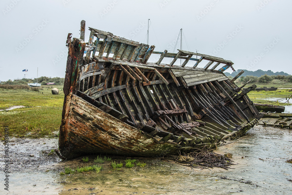 old, wooden fishing boat on the beach of Britanny old, wooden fishing boat on the beach of Britanny
