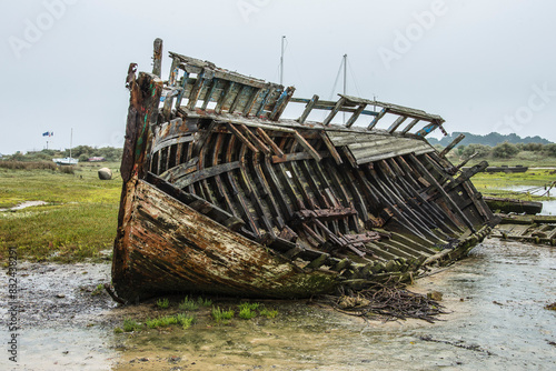 old, wooden fishing boat on the beach of Britanny