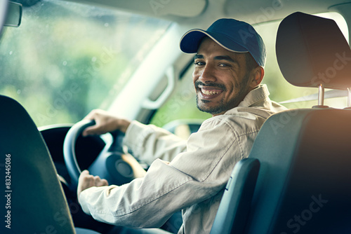 Portrait, driver or delivery man with smile for safety on cargo, stock or package in van in shipping business. Parcel order, car or happy courier driving in transportation for supply chain or freight © peopleimages.com