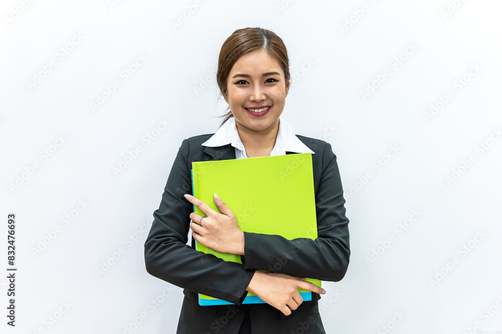 Smiling young Asian woman in casual black suit holding file on white background Smiling young Asian woman in casual black suit holding file on white background