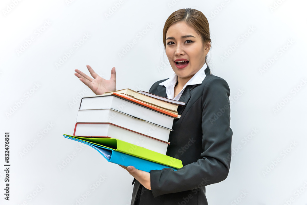 Portrait young Asian librarian holding stack of textbooks on white background Portrait young Asian librarian holding stack of textbooks on white background