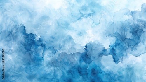 abstract background with a watercolor effect in various shades of blue