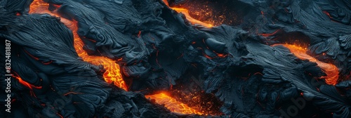 Dark orange mountains, with lava flowing from their peaks
