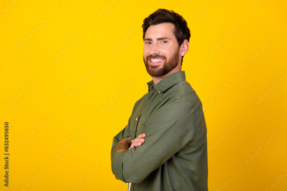 Fototapeta premium Profile photo of nice young man folded hands empty space wear shirt isolated on yellow color background