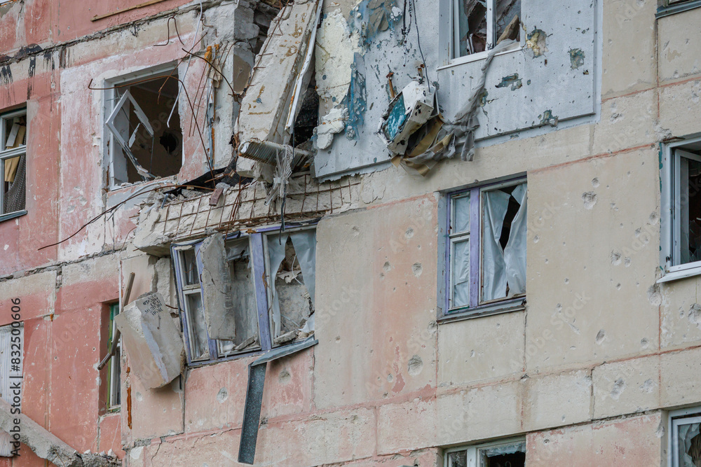 Destroyed and abandoned residental building during war in Ukraine.