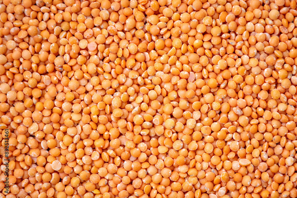 Red lentils or Masoor dal background. Raw ingredients for cooking. Red lentils or Masoor dal background. Raw ingredients for cooking.
