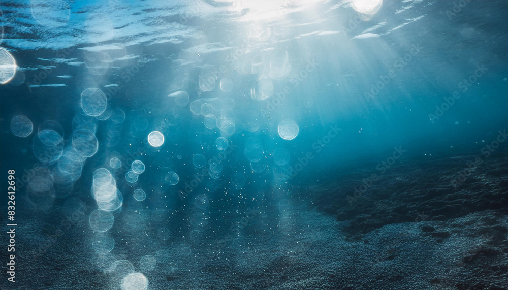 Obraz premium blue blurry underwater bokeh background