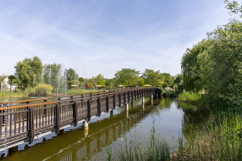 Bridge over pond in Botanical garden in Vienna, Austria Bridge over pond in Botanical garden in Vienna, Austria
