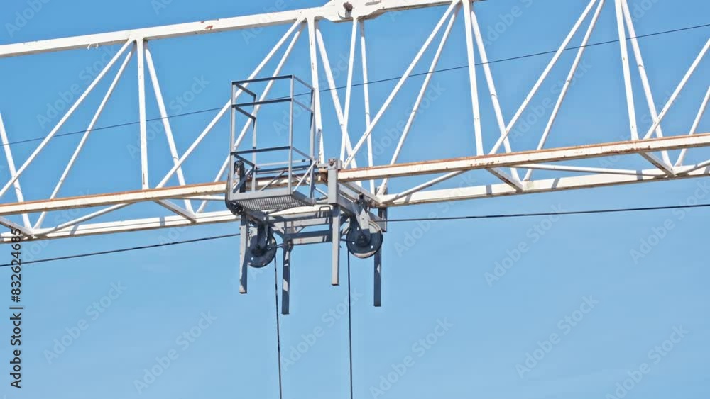 Construction Site Crane Pulley Trolley Moving Along Jib Construction Site Crane Pulley Trolley Moving Along Jib