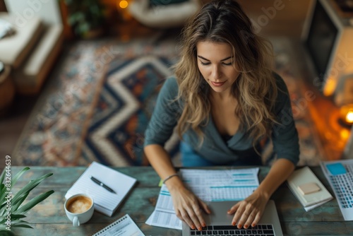 Woman working on laptop at home